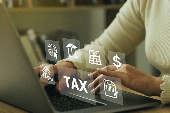 Person using laptop for tax calculations